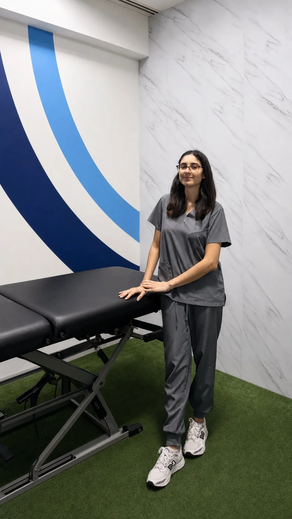 Fisioterapeuta de Optimum en una sala de tratamiento
